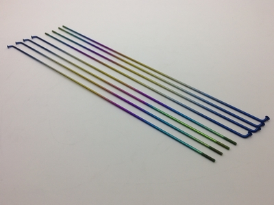 Anodized rainbow colored Titanium spokes made from titanium grade 5