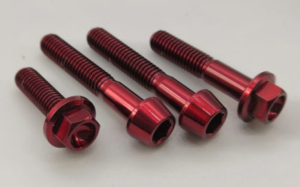 a photo of red titanium bolts