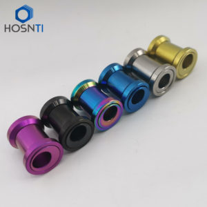 Titanium offset shock bushing