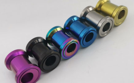 Titanium offset shock bushing